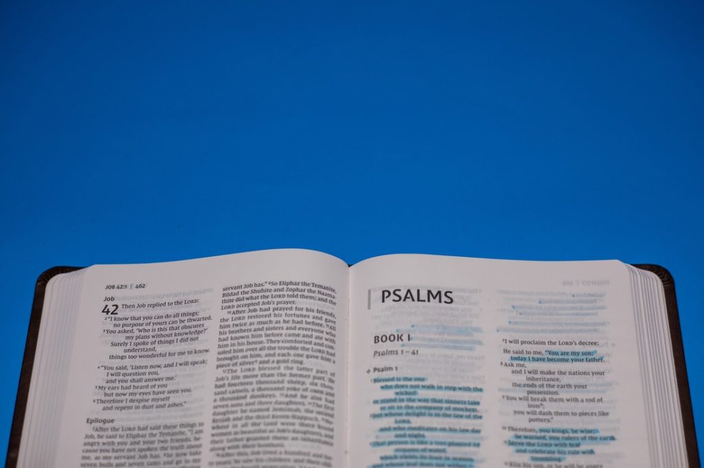 The Bible opened to the Psalms.